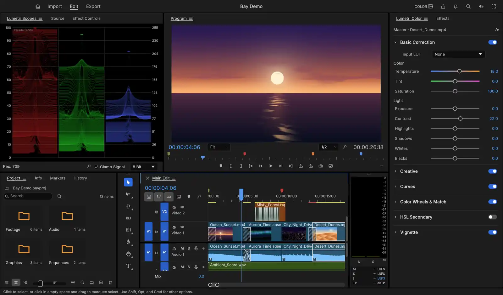 The Color workspace: an RGB parade on the left, a sunset in the Program monitor, and the Lumetri Color panel on the right with temperature and contrast raised on a clip of desert dunes.